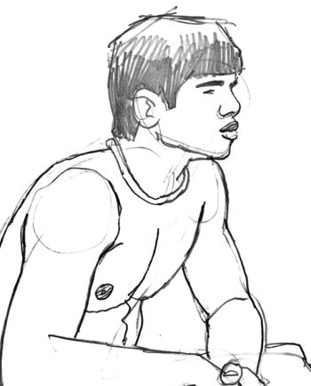 Marcus Squatting on Rock